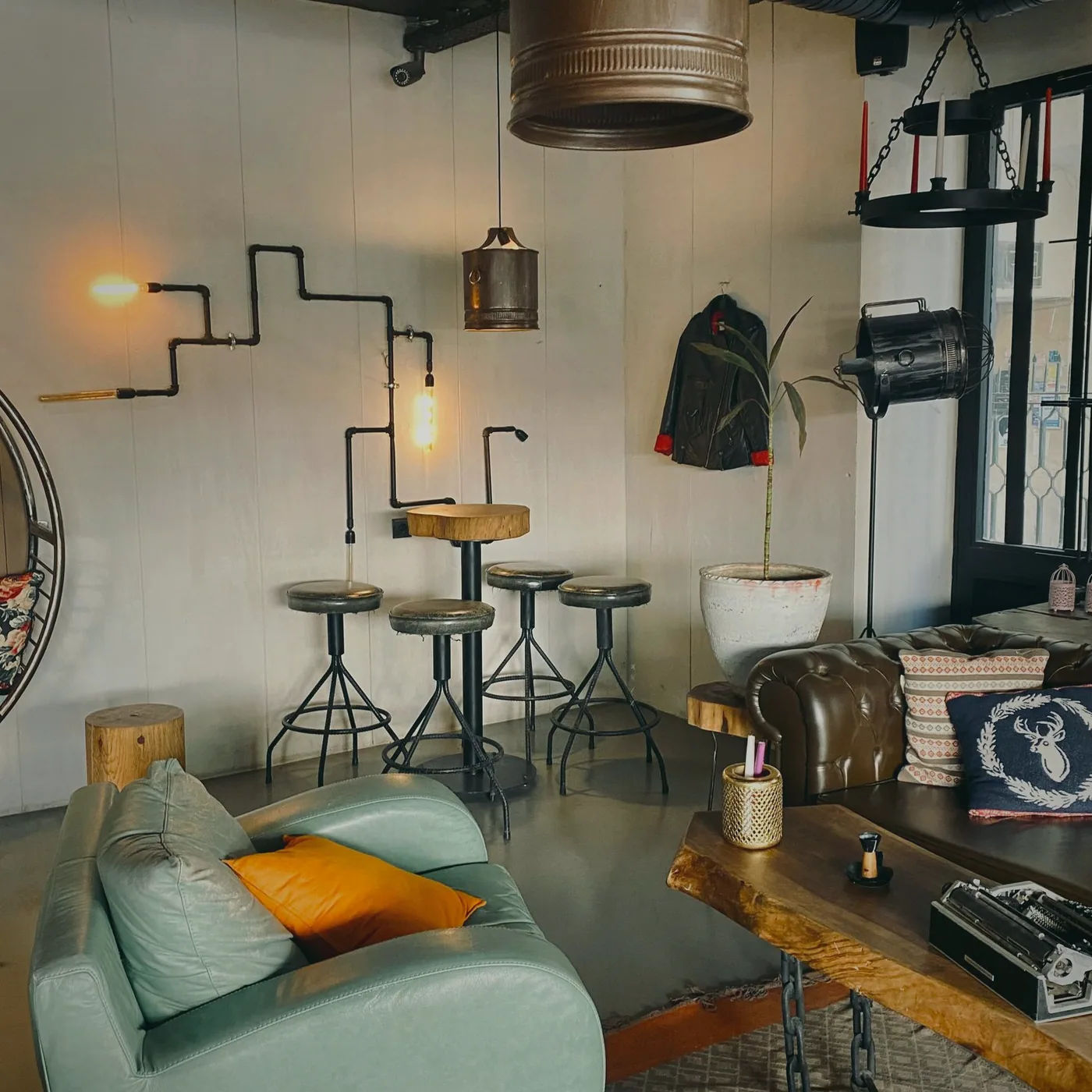Sofas and shelves at the quiet end of the club room